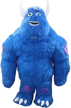 Blue fuzzy monster plush toy with white horns, large eyes, and white claws, facing forward.